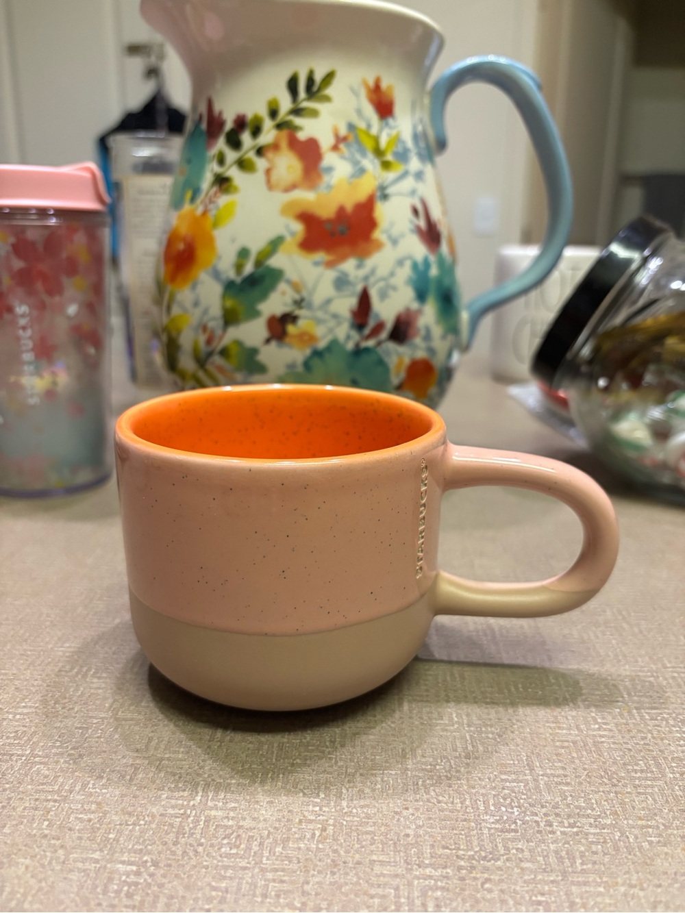 Starbucks Pink Ceramic Mug with Orange Interior and Cream Base
